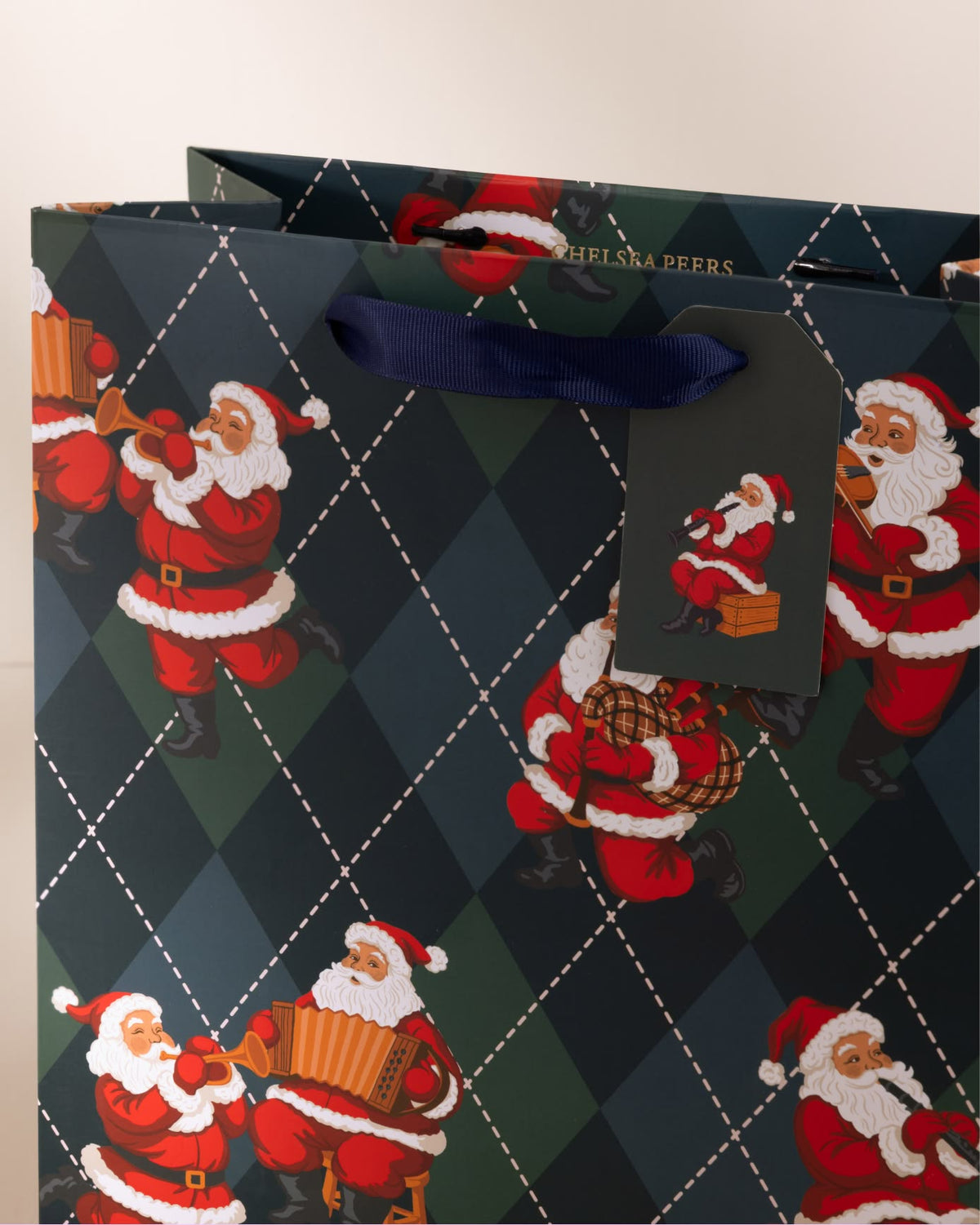 Argyle Musical Santa Print Gift Bag