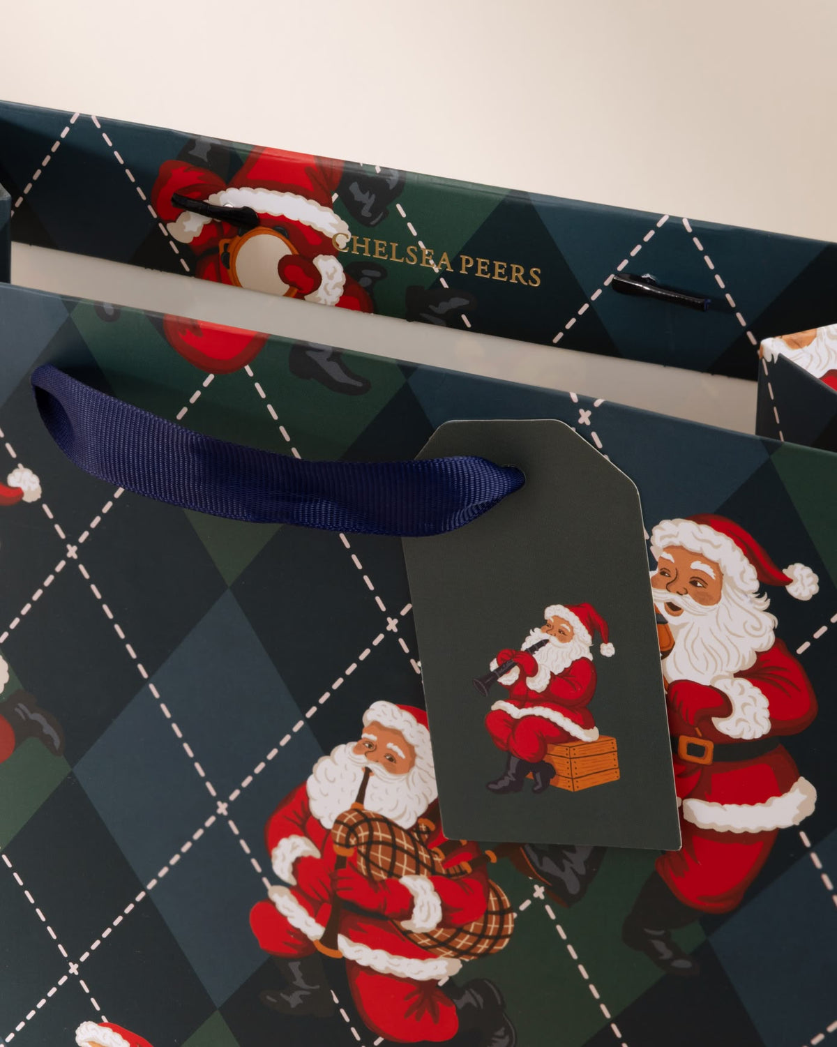 Argyle Musical Santa Print Gift Bag