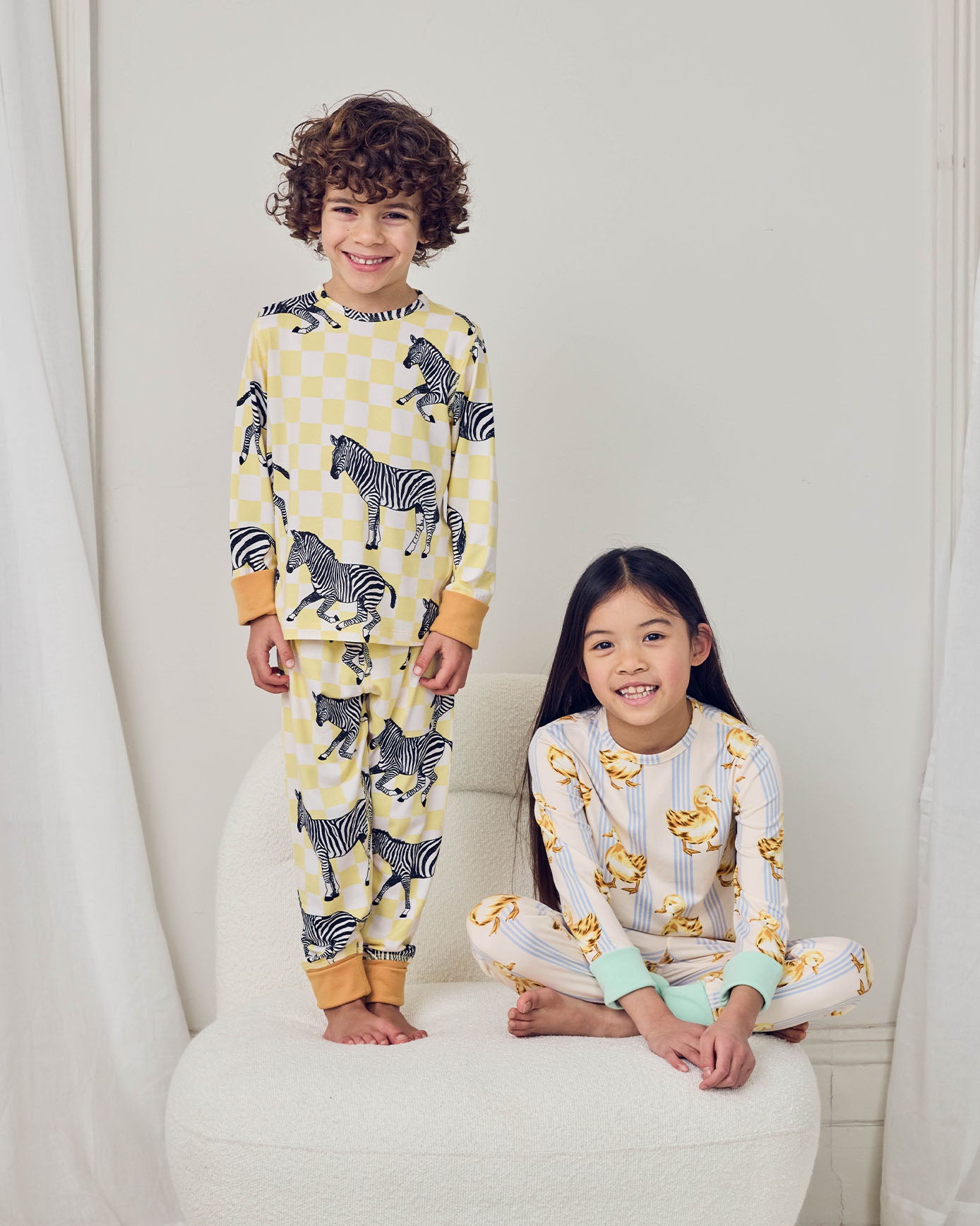 model note: (Left) Cassius is 3'6 and is wearing size UK 5-6. (Right) Charlotte is 5 years old, 3'11 and is wearing size 5-6 years